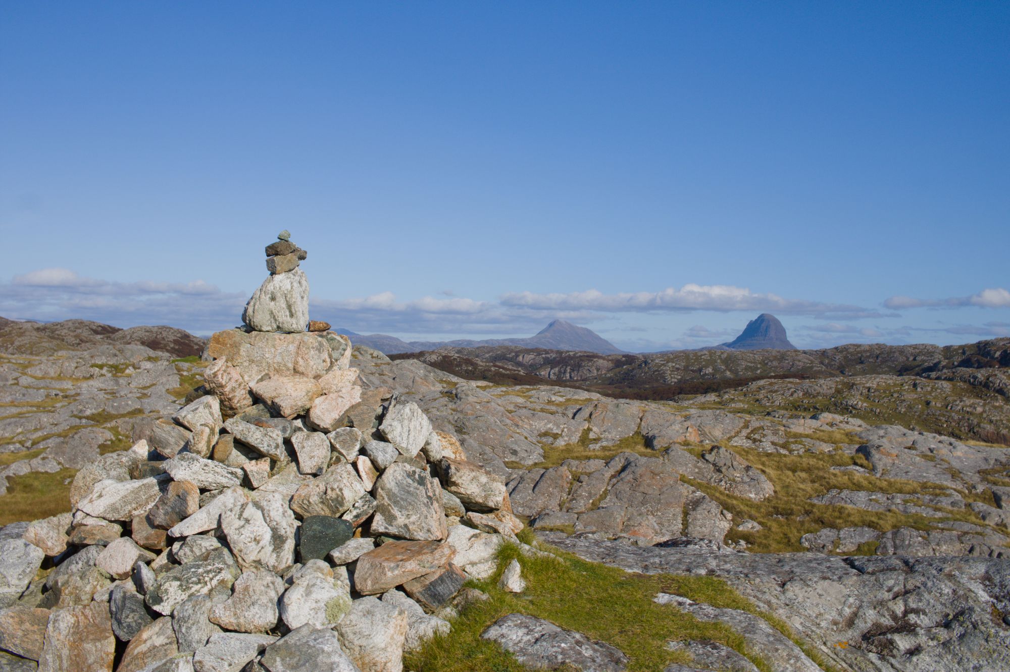 Highland peaks and mountain roads along the North Coast 500 in Scotland